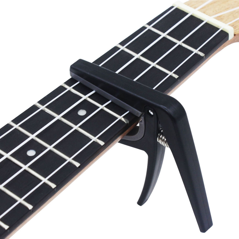 Capo para Ukelele Profesional  - Musical Instrument Hawaii reseña y precio